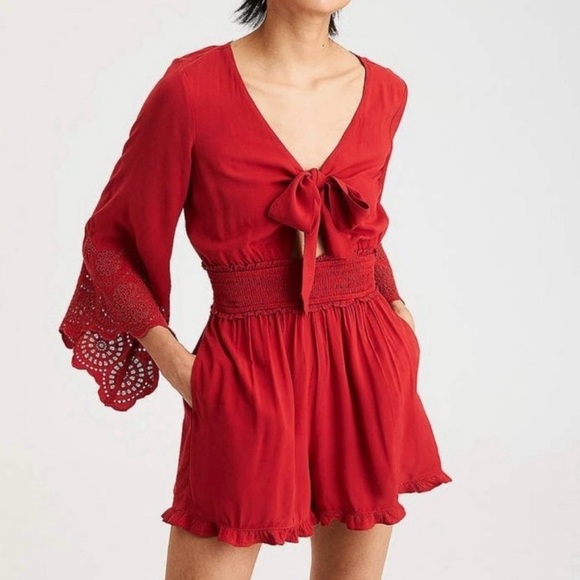 American Eagle Outfitters Pants - American Eagle Womens Red Front Bow Tie Bell Sleeve Romper XS Smocked Waist NWT